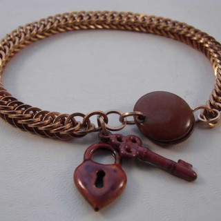 Bronze-HP4in1-with-Copper-Clasp-and-Charms